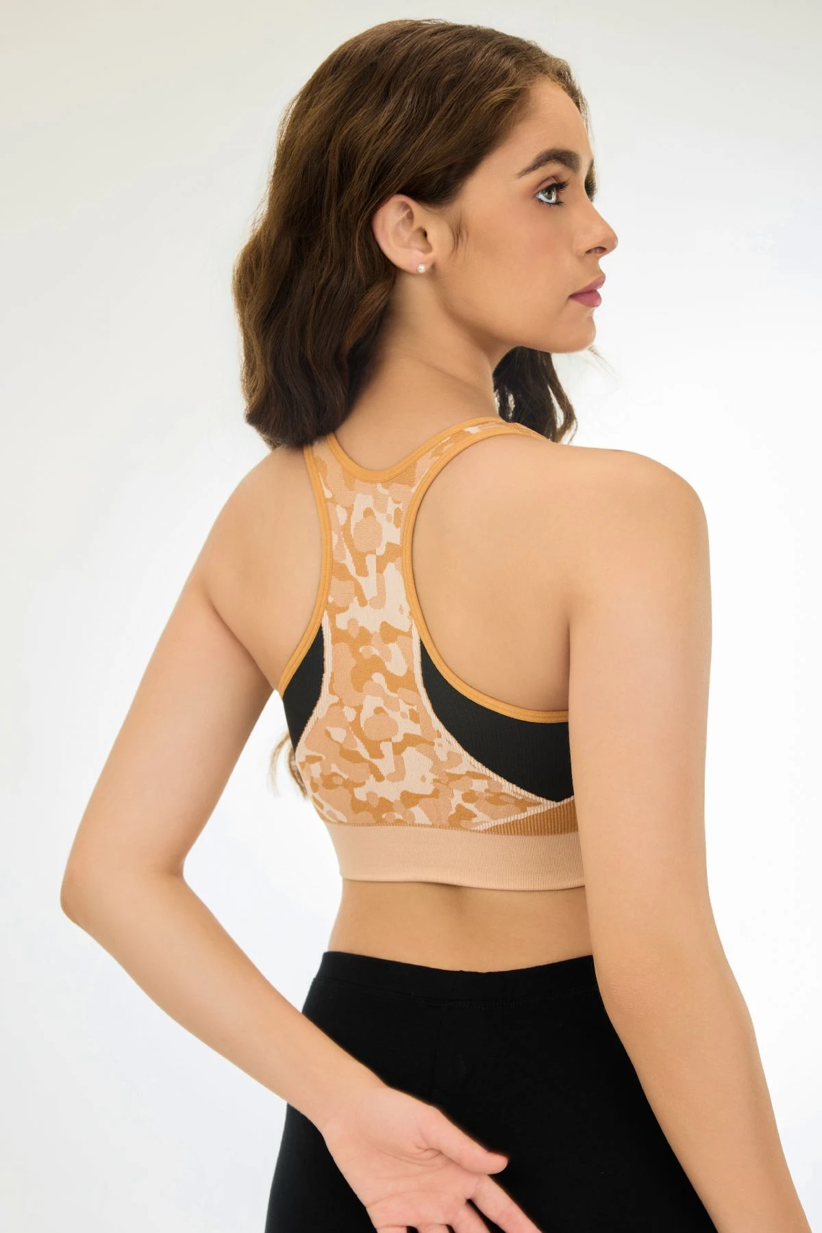 Buy Knitted Seamless Multi-Angle 360° Stretch Removable padding Medium Impact Sports Bra